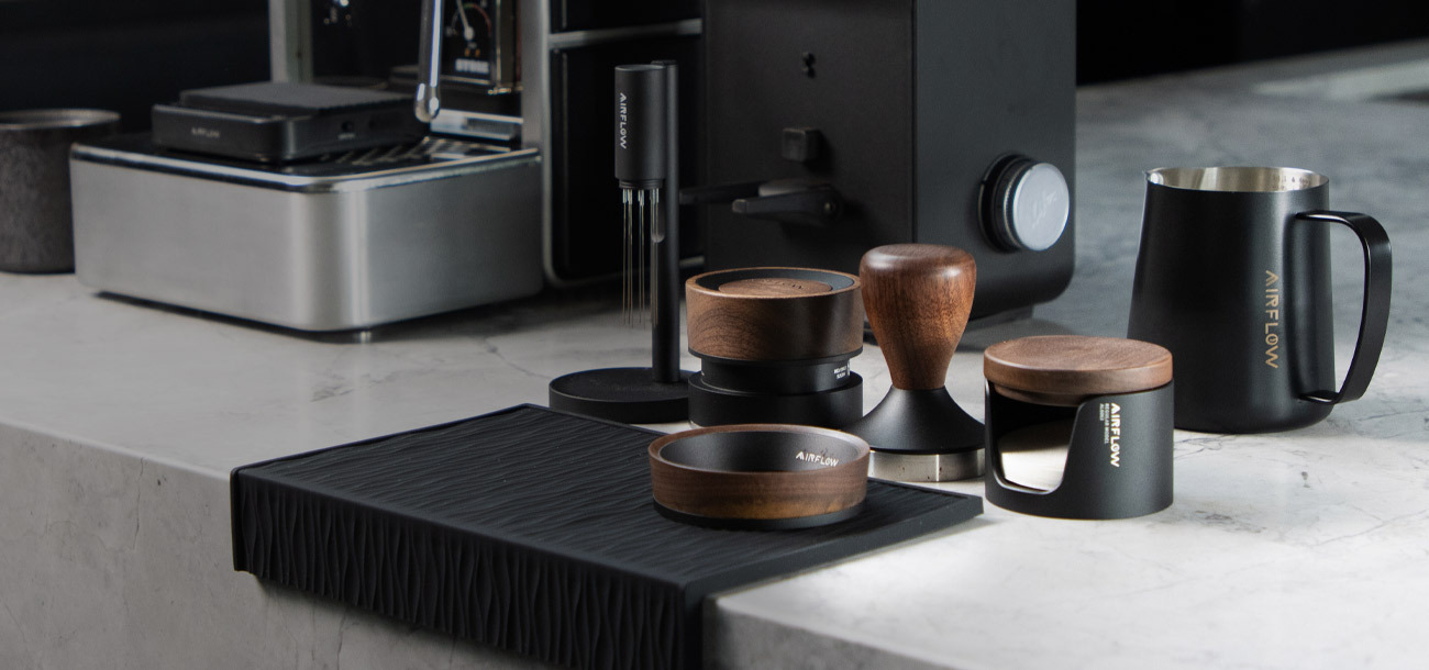 Airflow coffee tools and accessories on a bench